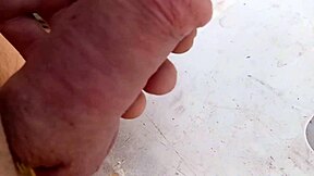 A close up and slow motion video of a gay man enjoying masturbation