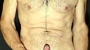 Gay man strips down and jerks off for the camera.