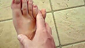 Young gay man shows off his feet and has raw sex scenes