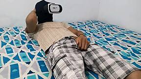 Enjoying solo pleasure with VR glasses while watching porn