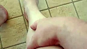 Young gay man shows off his feet and has raw sex scenes