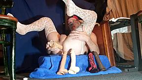 Young gay man in sexy nylons gets fucked by several anal toys at once