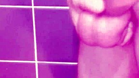 Solo masturbation session with cum and spanking in bathroom setting