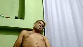 Serbian stud boldly strokes his hard cock in solo action.