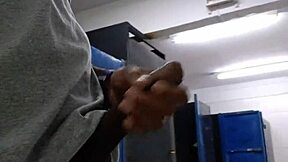 Bursting with desire in public bathroom stall.