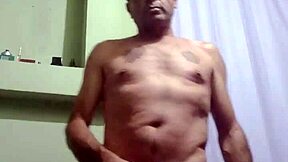 Serbian stud boldly strokes his hard cock in solo action.