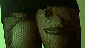 Travesti in black dress showing off style