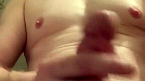 Sexy shaved soloboy strokes his big horny cock