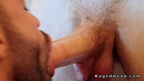 Shaved guy sucks big cock then takes anal in bathroom. Cumshot follows intense bareback session