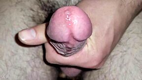 Dripping precum builds up from big cock stimulation. Then sticky cum explodes everywhere.