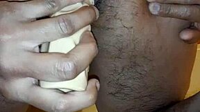 Dildo insertion leads to peeing release.