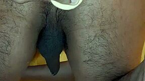 Dildo insertion leads to peeing release.