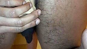 Dildo insertion leads to peeing release.