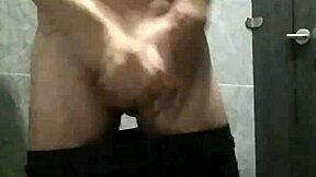 guy jerks his cock off in public toilet