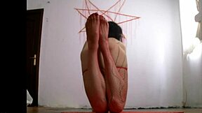 skinny long-haired crossdresser shows off his ass and feet