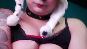 A tranny shows her large feminine breasts