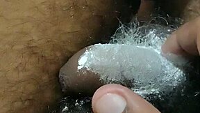 Gay boy rubs cream on his body