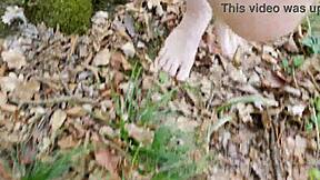 Walking the forest trail barefoot and naked