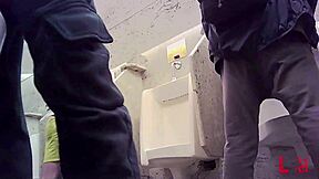 Group action happens inside public toilet stall