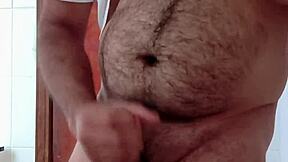 Secret Handjob Ends With A Huge Load In The Sink