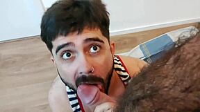 Twink gags on hairy Latino daddy's uncut cock.