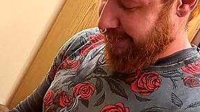 ginger guy in leather gets on his knees for blowjob