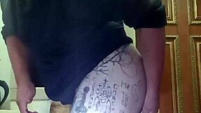 The Tattooed Russian Whore Is Masturbating Her Small Penis