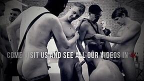 Masked group takes turns rimming and pounding twink's tight ass. Big cocks dominate the wild fetish scene.